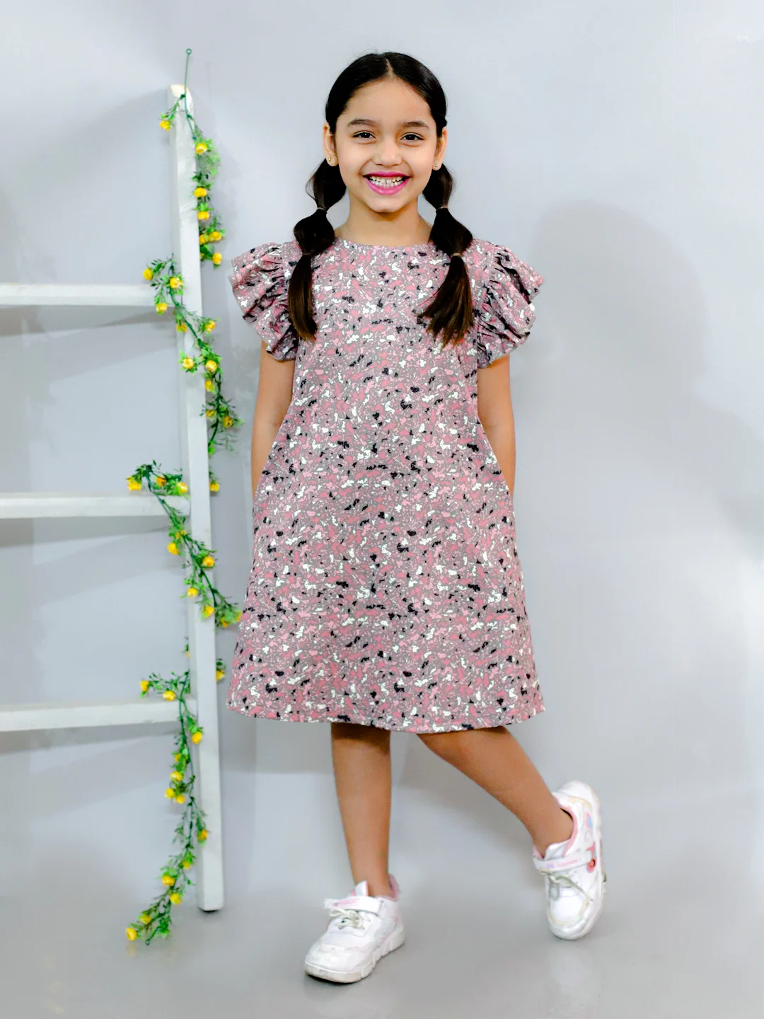 Flared sleeves all over printed A-Line knee length dress comes with concealed pockets brown